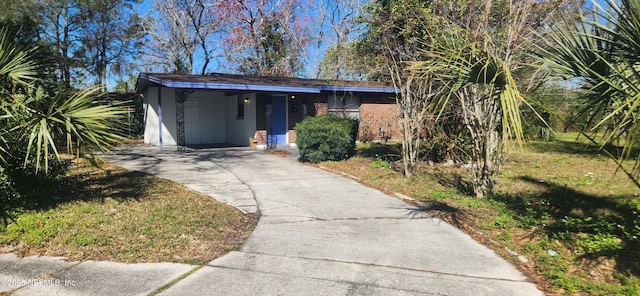 view of front of house with a carport