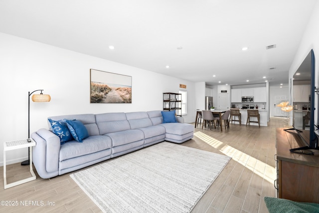 living room with light wood-type flooring