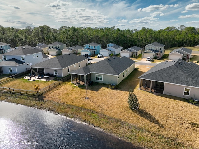 drone / aerial view featuring a water view