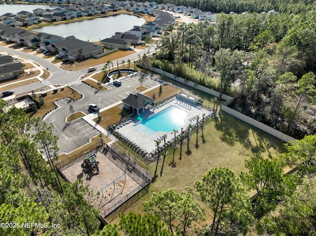 drone / aerial view with a water view