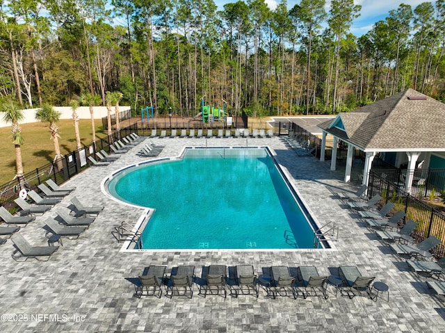 view of swimming pool with a gazebo and a patio