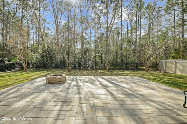 view of patio featuring a fire pit