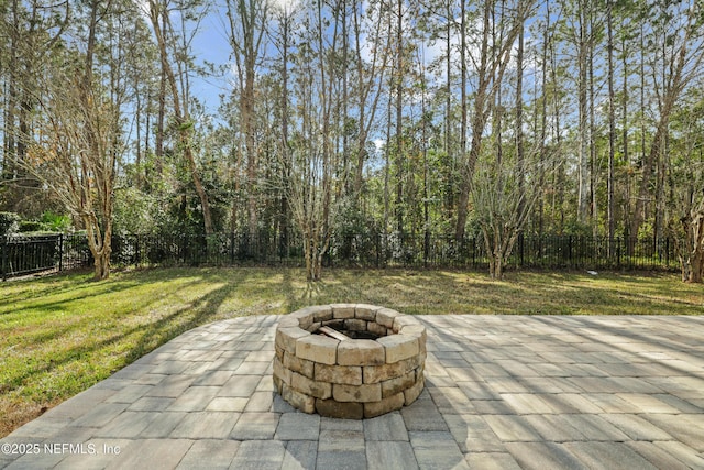 view of patio with an outdoor fire pit