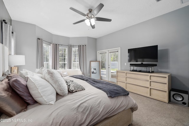 bedroom featuring carpet floors, access to outside, ceiling fan, and french doors