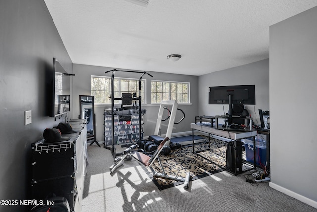 workout room with carpet floors, vaulted ceiling, and a textured ceiling