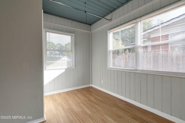 spare room featuring light wood-type flooring