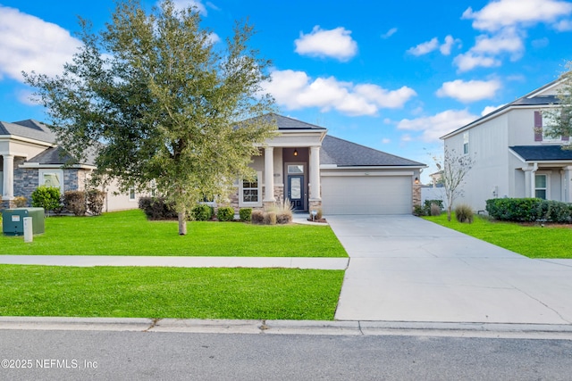 view of front facade with a garage and a front yard