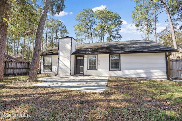 rear view of property with a patio