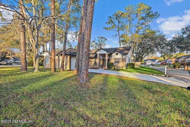 view of front of house with a front lawn