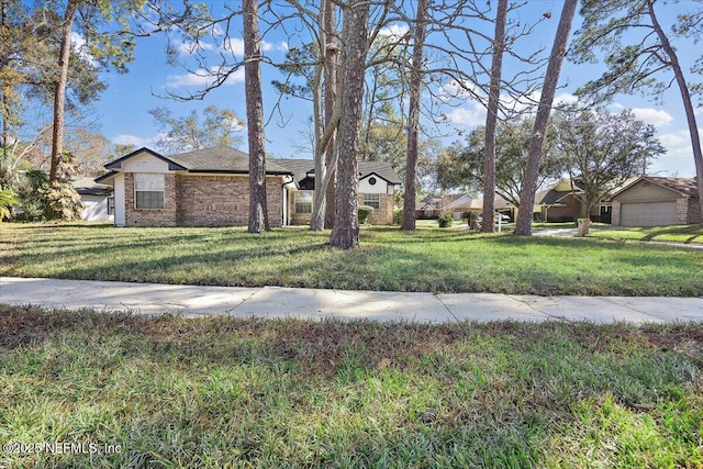 view of front facade with a front lawn