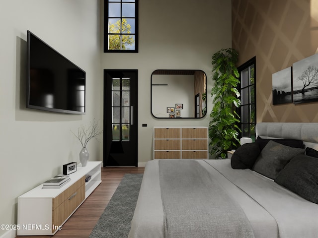 bedroom featuring dark hardwood / wood-style flooring