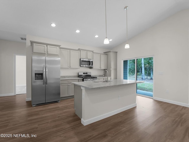 kitchen with appliances with stainless steel finishes, sink, gray cabinetry, and a center island with sink