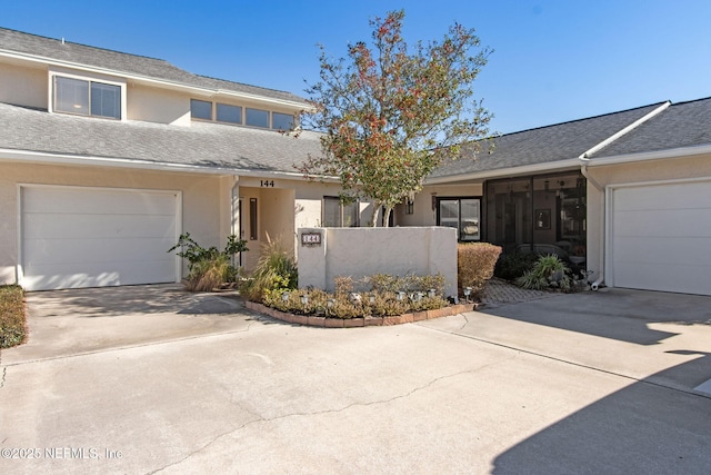 view of front of property featuring a garage