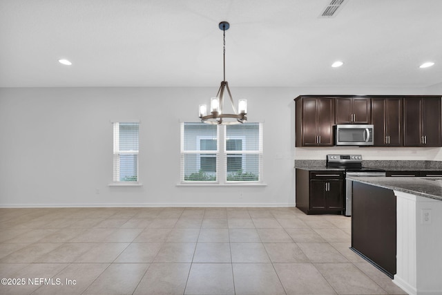 kitchen featuring pendant lighting, light tile patterned floors, appliances with stainless steel finishes, dark brown cabinetry, and a chandelier