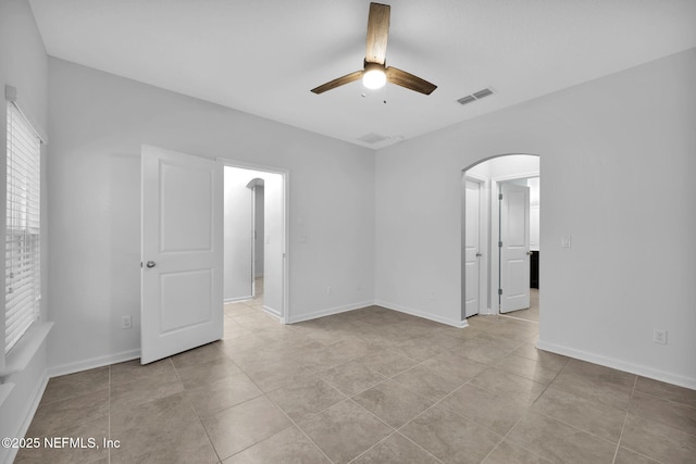 spare room featuring ceiling fan