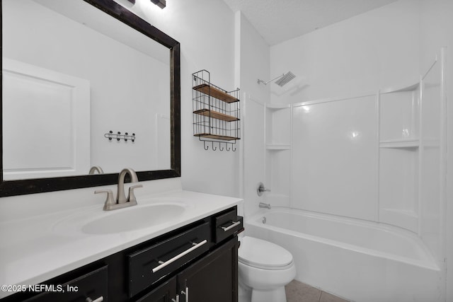 full bathroom featuring toilet, shower / bathing tub combination, a textured ceiling, vanity, and tile patterned flooring