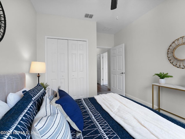 bedroom featuring ceiling fan and a closet