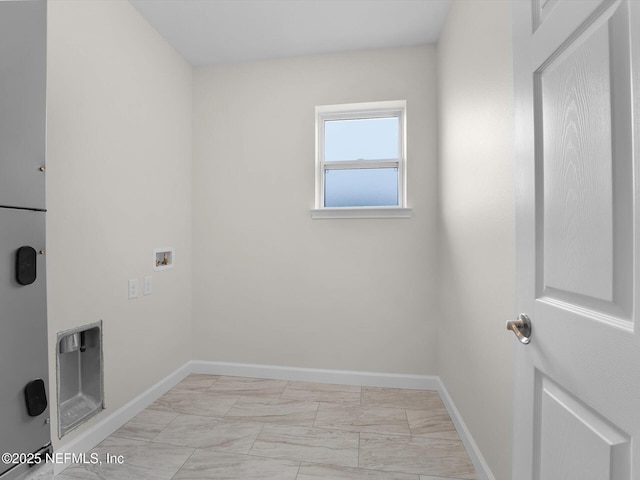 laundry room with heating unit and hookup for a washing machine