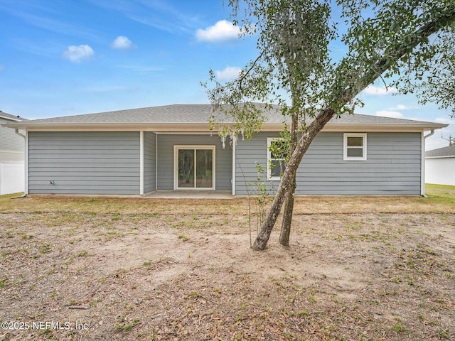 back of property with a patio area