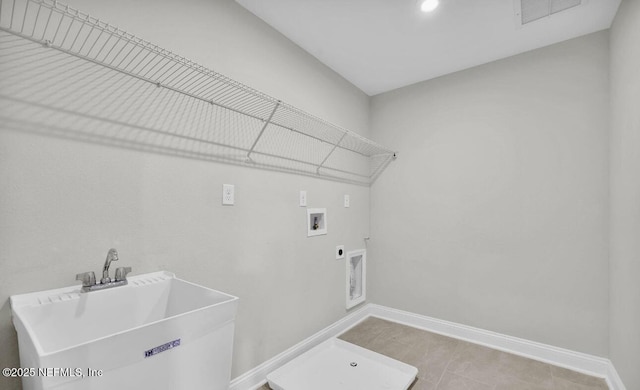 laundry area with electric dryer hookup, sink, and hookup for a washing machine