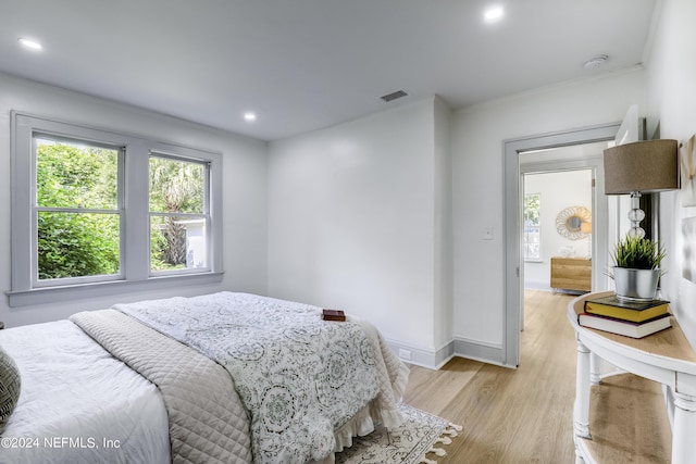 bedroom featuring light wood-type flooring