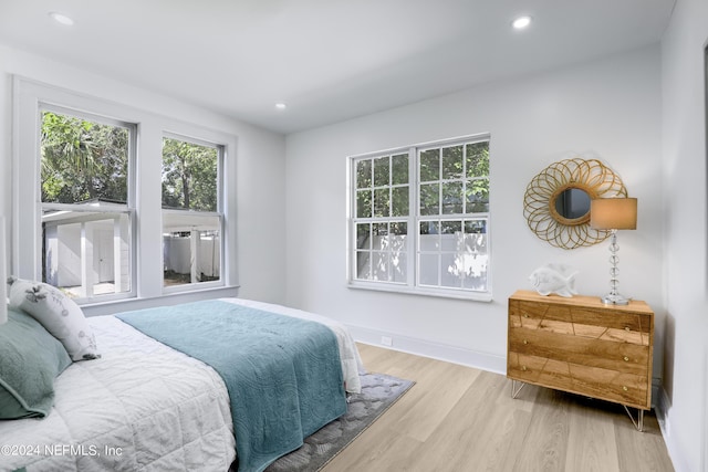 bedroom featuring light wood-type flooring