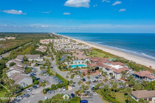 aerial view featuring a beach view and a water view