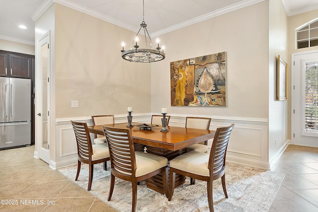 tiled dining space with ornamental molding and a notable chandelier