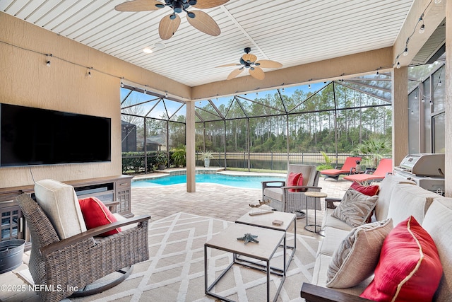 exterior space featuring a fenced in pool, a grill, glass enclosure, and an outdoor living space