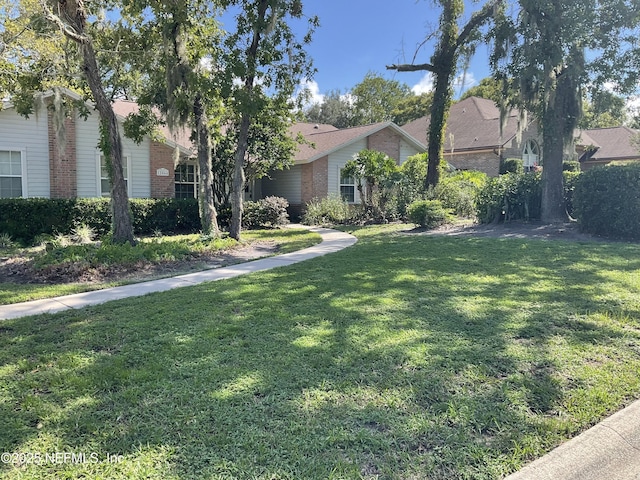 view of front of property with a front lawn