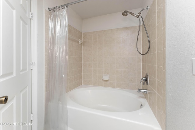 bathroom with shower / bath combo