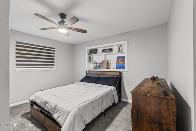 bedroom with a textured ceiling, ceiling fan, and carpet flooring