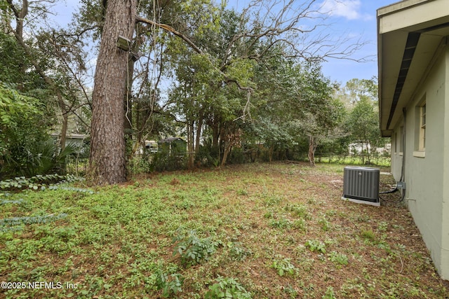 view of yard with central air condition unit