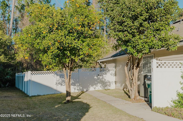 view of property exterior with a lawn