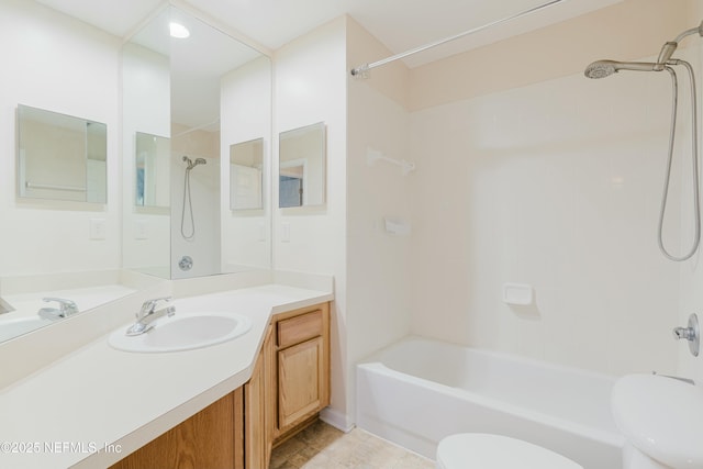 full bathroom with toilet, vanity, and tiled shower / bath combo