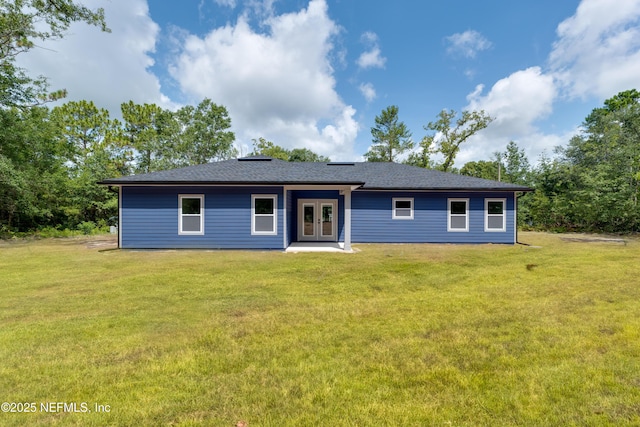 ranch-style home with a front yard