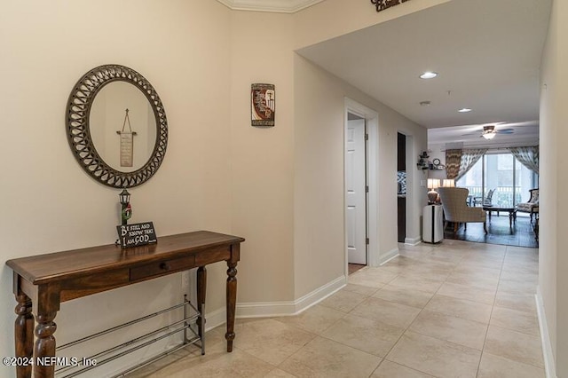 hall featuring light tile patterned floors