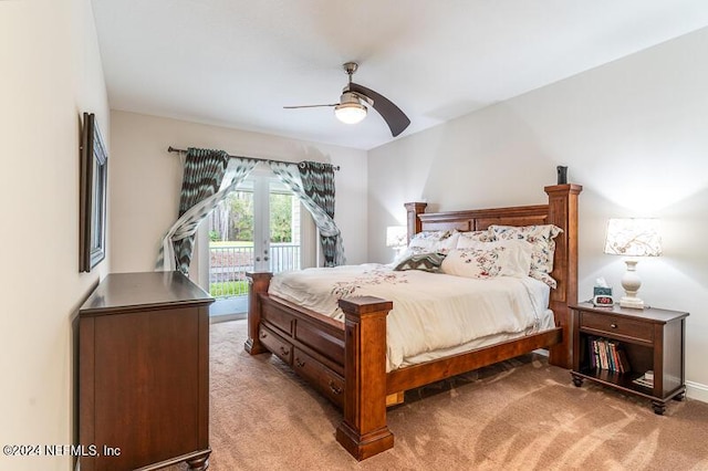 bedroom featuring ceiling fan, light colored carpet, and access to outside