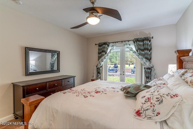 bedroom with ceiling fan and access to outside