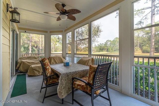 sunroom with ceiling fan and a wealth of natural light