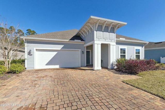 view of front of house with a garage