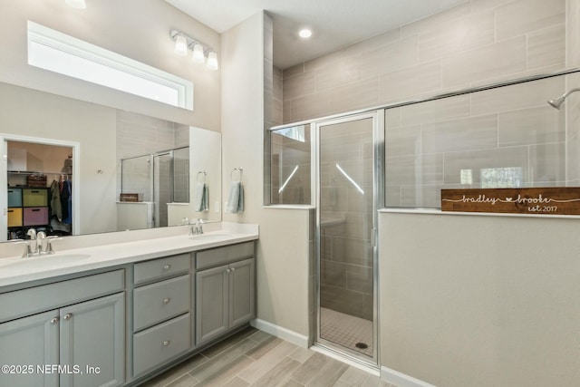 bathroom featuring vanity and walk in shower