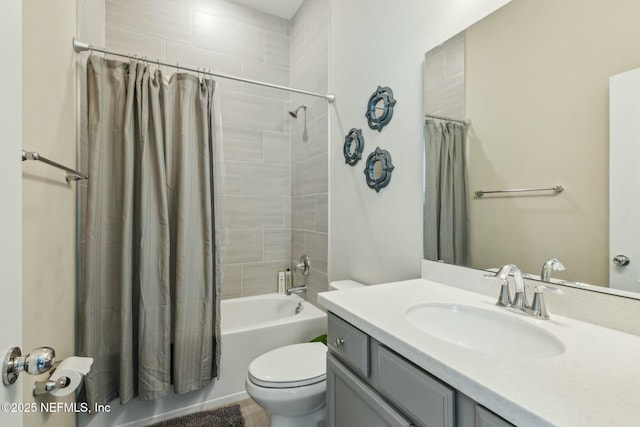 full bathroom featuring toilet, vanity, and shower / bathtub combination with curtain