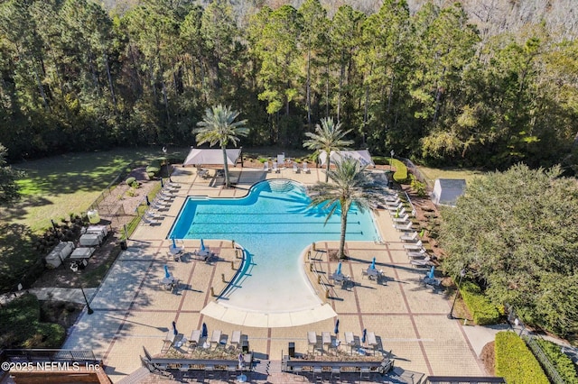 view of swimming pool with a gazebo and a patio area