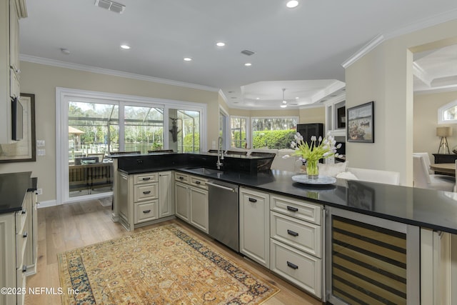 kitchen featuring sink, stainless steel dishwasher, crown molding, and wine cooler