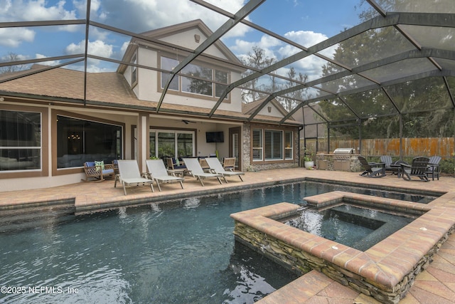 view of pool featuring a patio area and an in ground hot tub