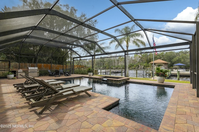 view of swimming pool with an in ground hot tub, a water view, a lanai, area for grilling, and a patio area