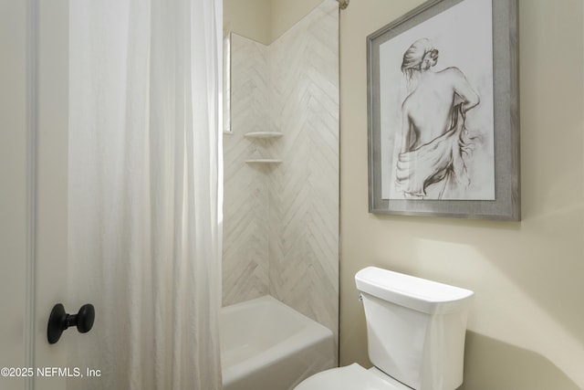 bathroom featuring toilet and shower / tub combo with curtain