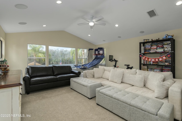 carpeted living room featuring lofted ceiling and ceiling fan