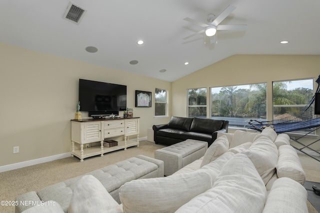 living room featuring lofted ceiling, light colored carpet, and ceiling fan